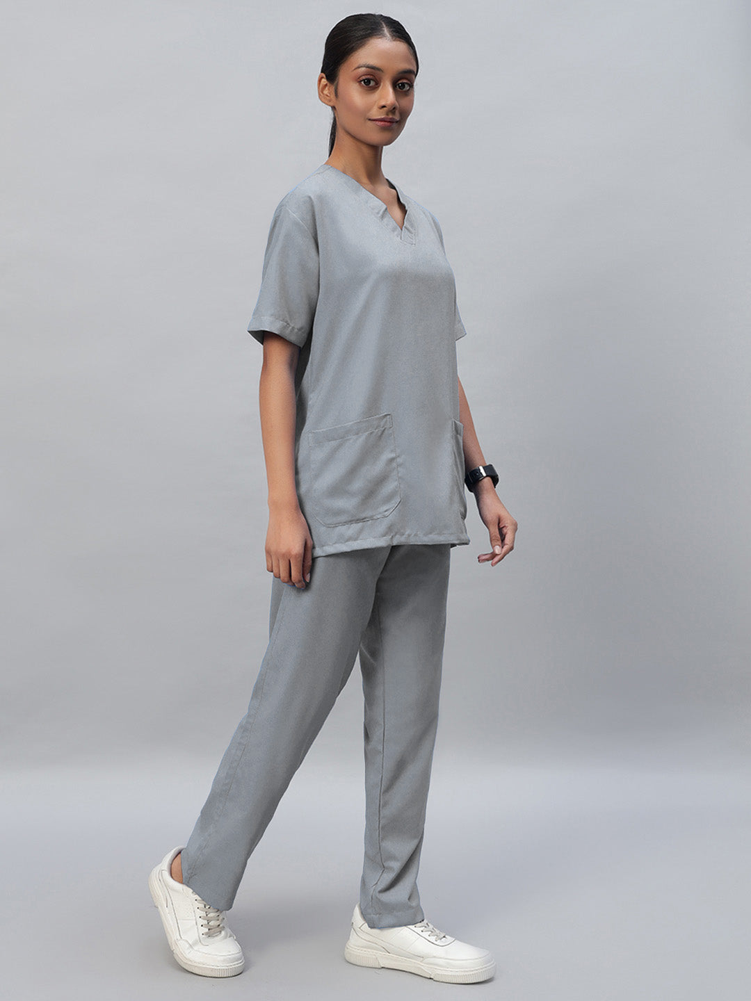 side look of grey medical scrub for women
