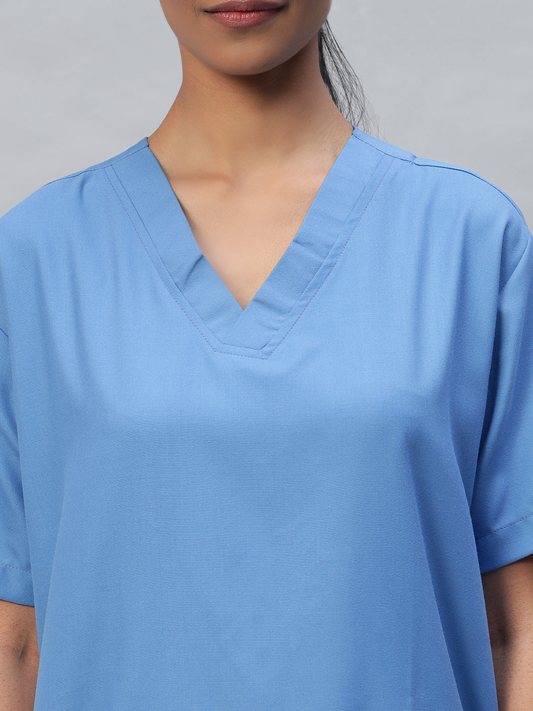 zoomed look of v-neck scrub set for women