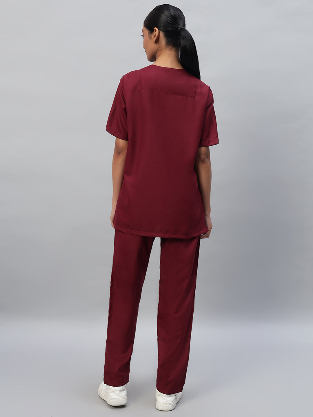 back look of Maroon color medical scrub for women