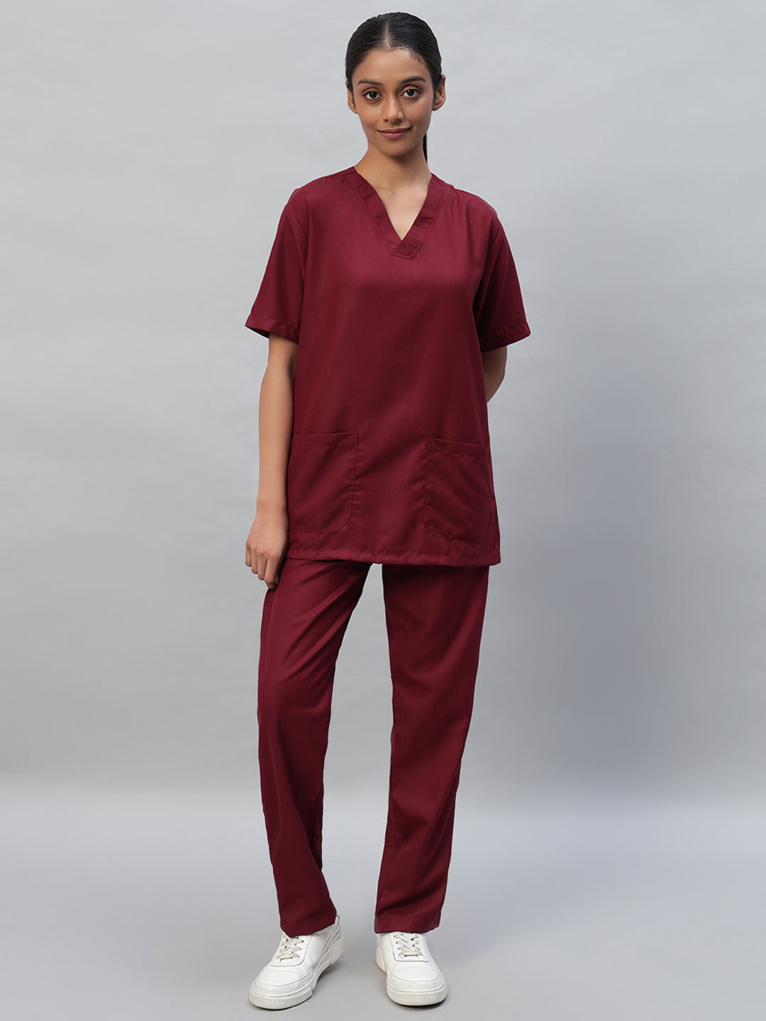 Maroon color medical scrub suit set with a V-neck top and half sleeves sleeves