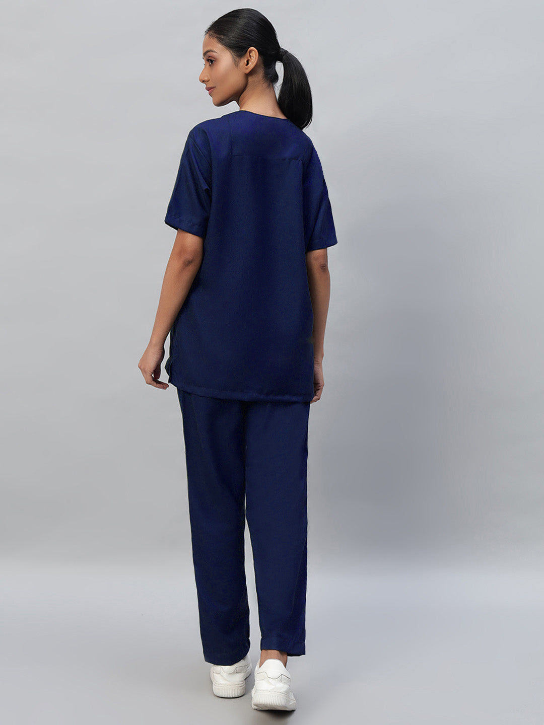 Back look of navy blue medical scrub for women