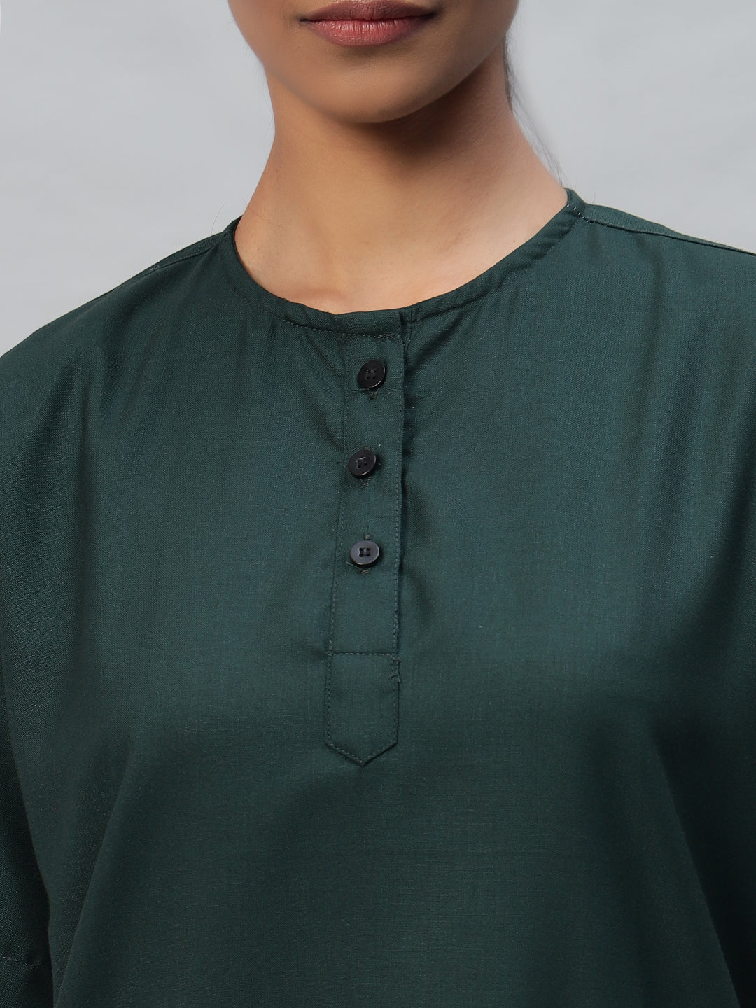 close look of Dark green color Medical Scrub for women