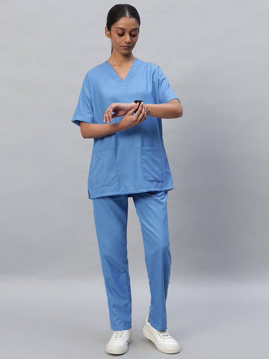 Sky Blue medical scrub for female with a V-neck, half sleeve top and elastic bottom with drawstrings, featuring multiple pockets.