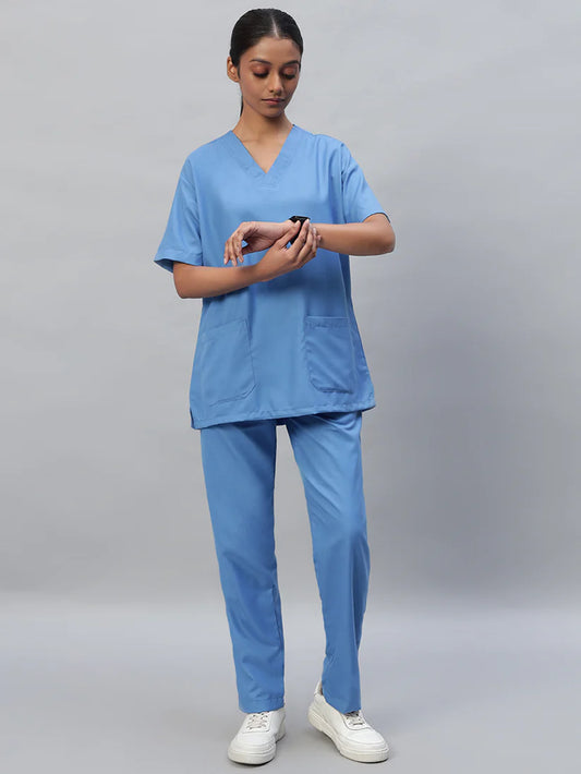 Women's Sky blue medical scrub suit with a V-neck, half sleeve, and front pocket, paired with full matching pants