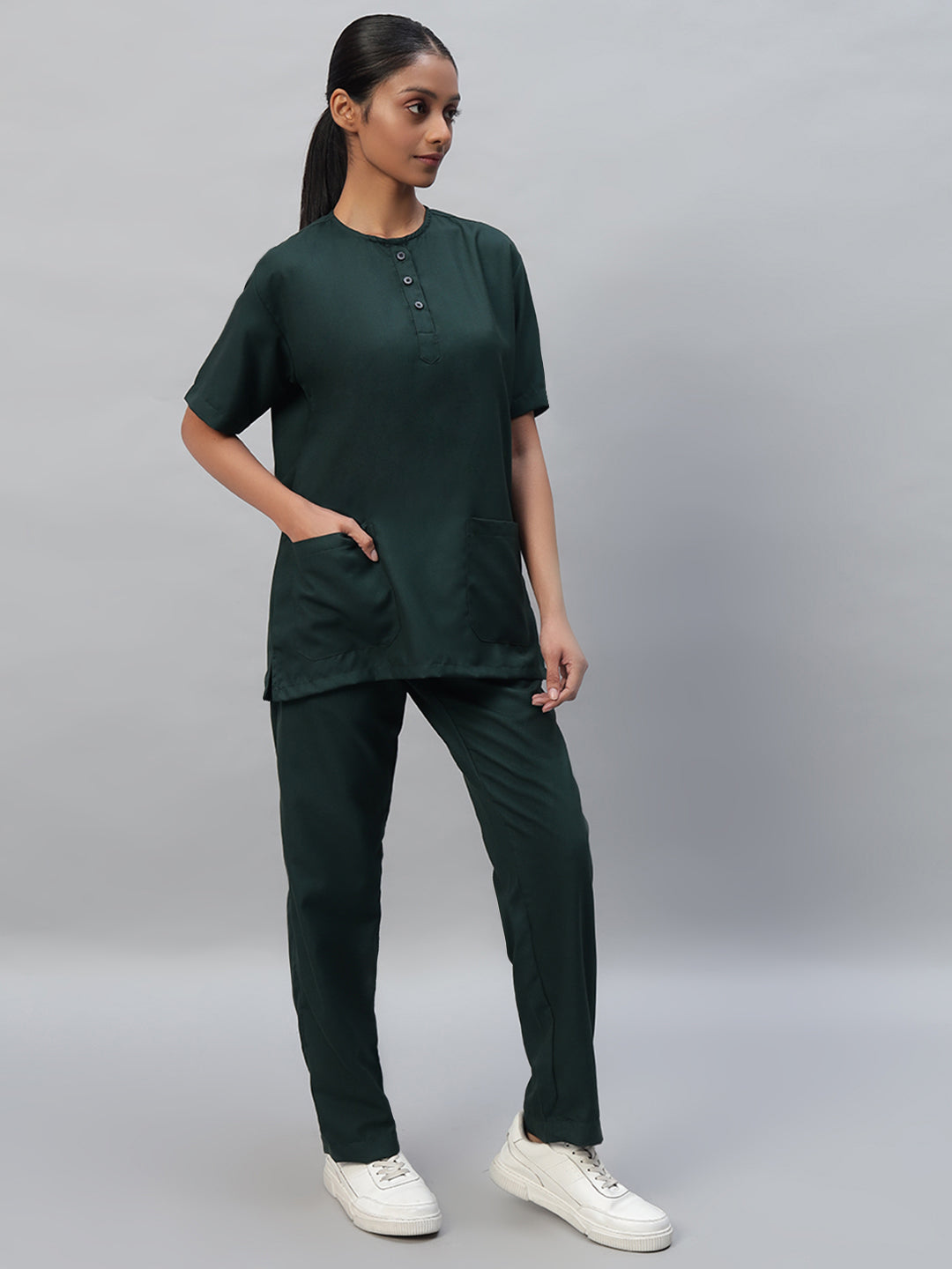 side look of Dark green color Medical Scrub for women