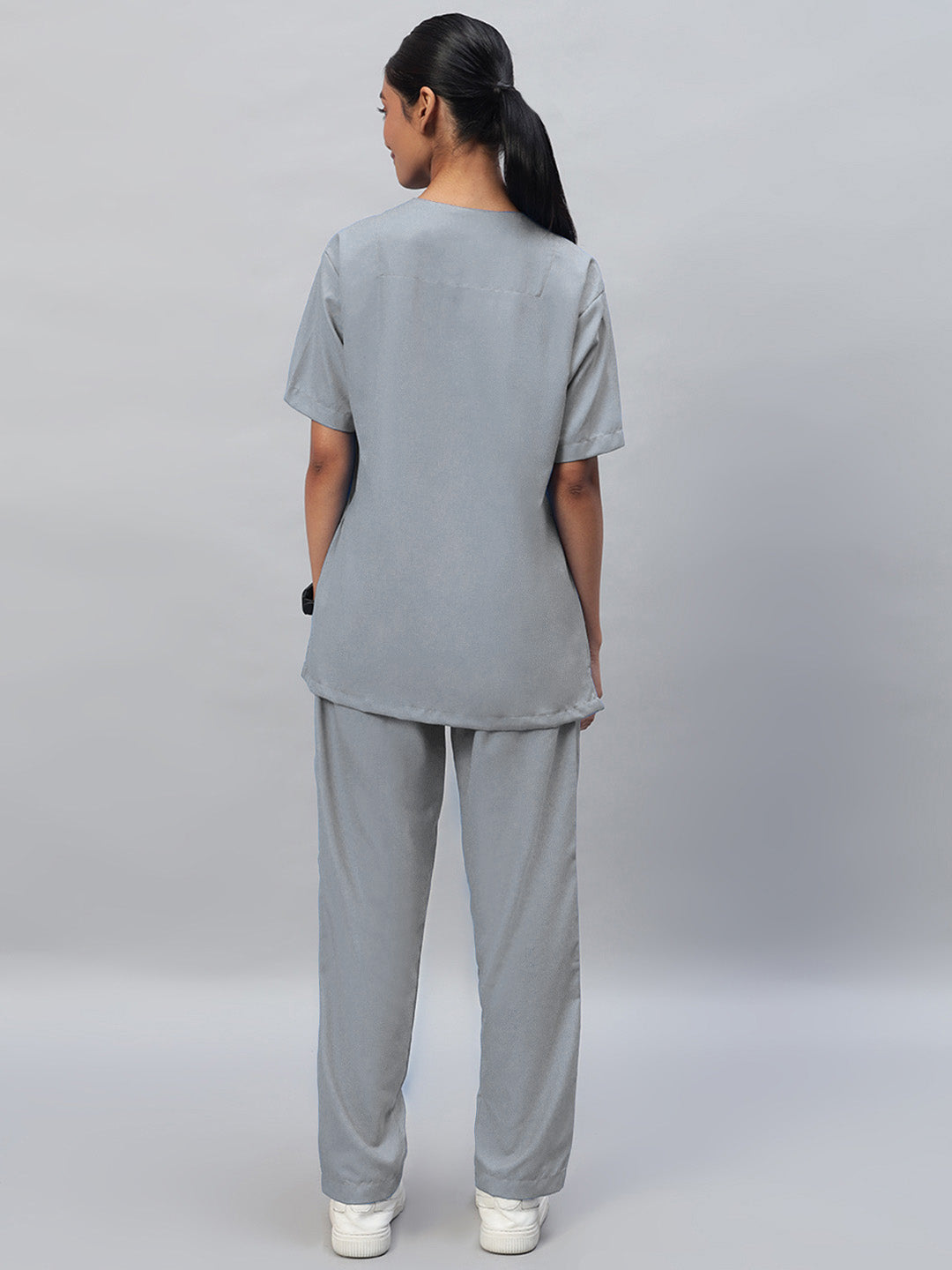 back look of Grey medical scrub for women in v-neck top and matching pant