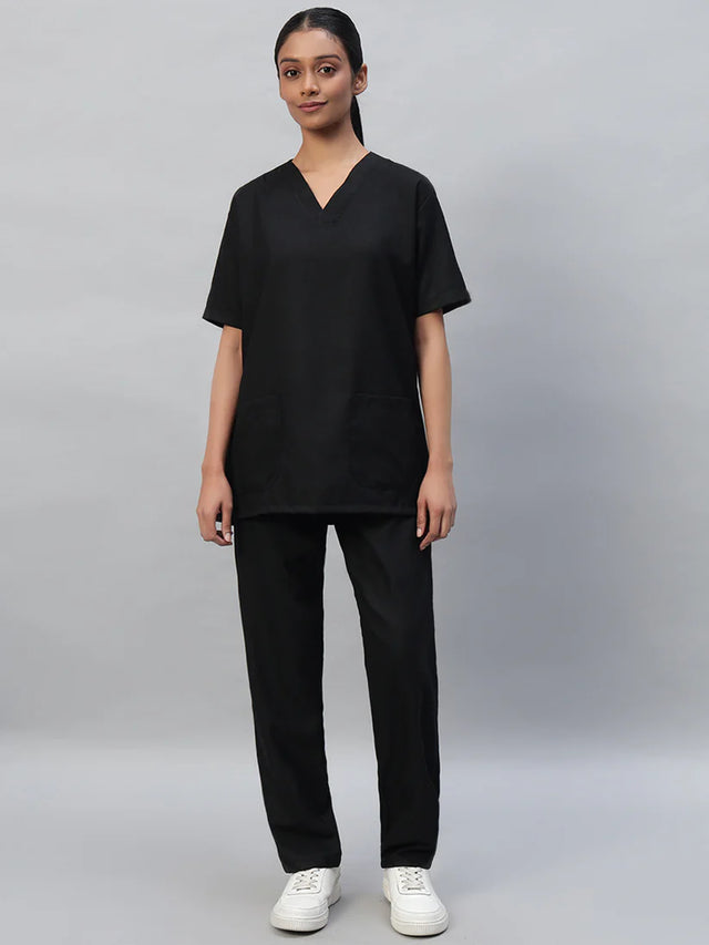 A female wearing  black V-neck, half sleeve medical scrub top and matching pants 