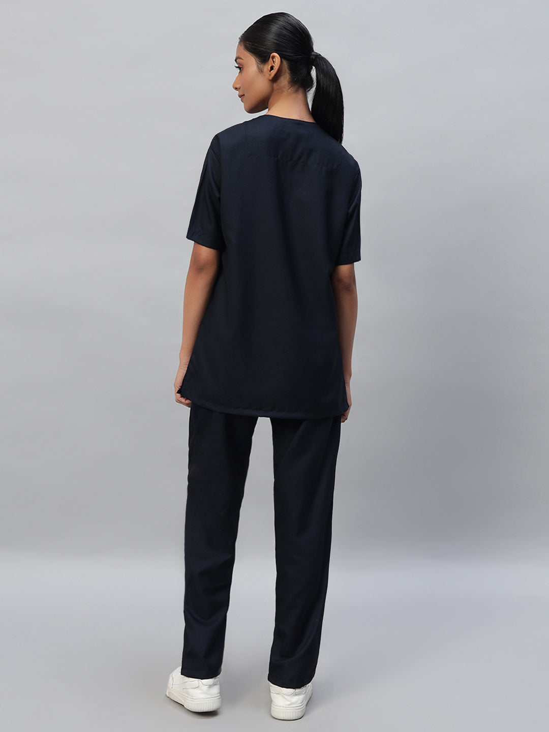 Back look of blue black medical scrub for women 