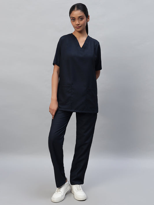 Blue black medical scrubs with a V-neck, half sleeve top and elastic bottom with drawstrings, featuring multiple pockets.