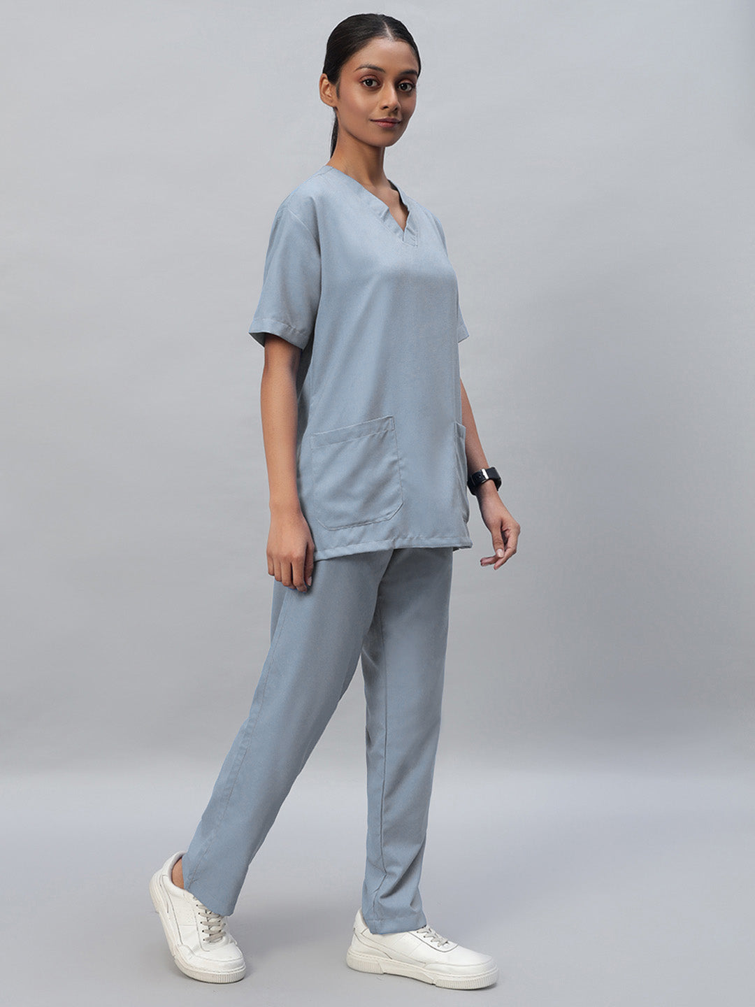 Light grey medical scrub with a V-neck top and matching pant