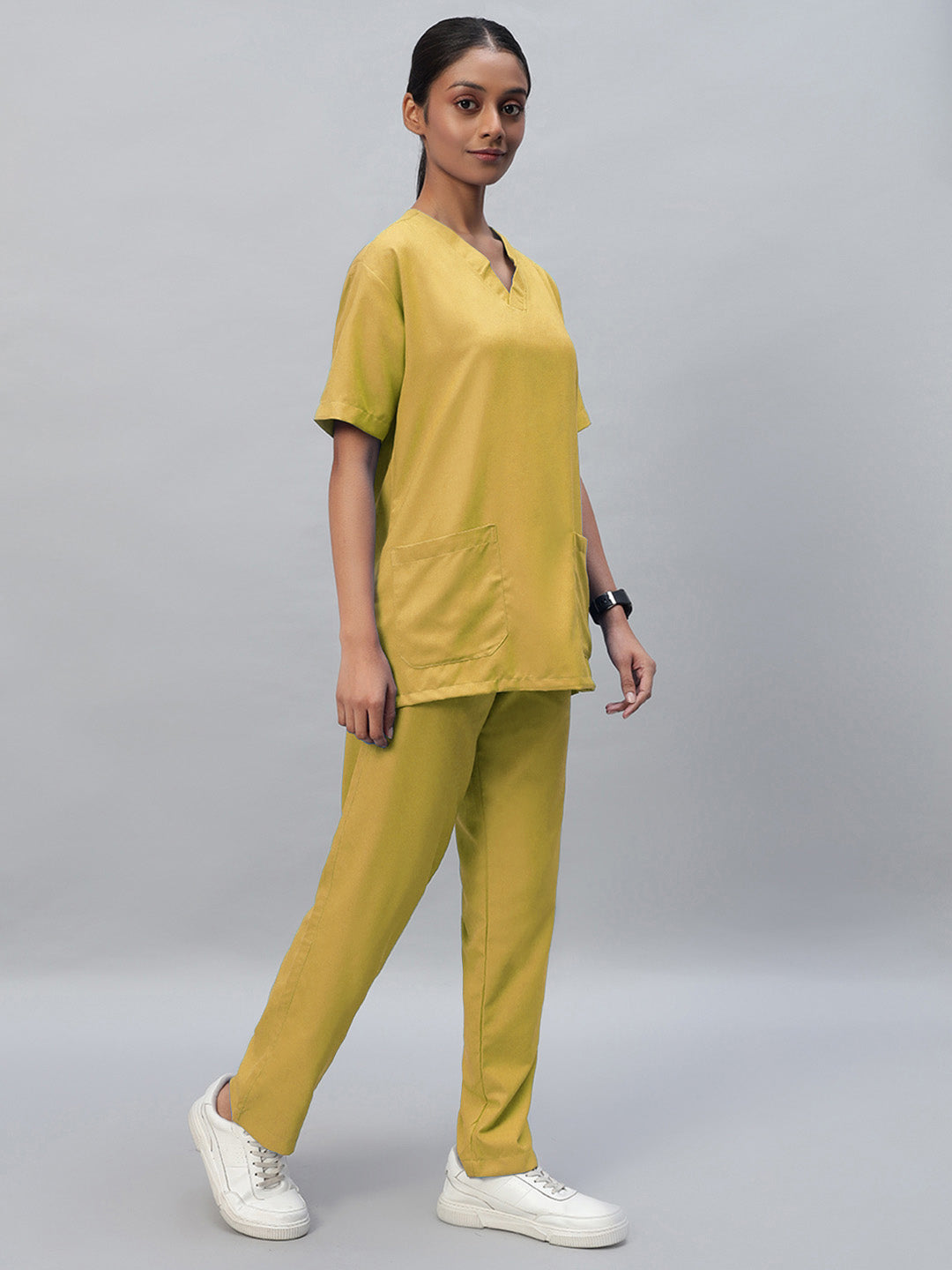 Yellow half sleeve medical scrubs with a V-neck top and full elastic bottom with drawstrings.